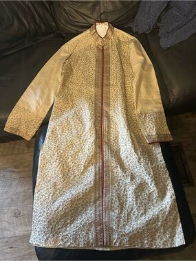 Men’s Embroidered Cream Sherwani with Red-Gold Trim
• Worn 1 time
• Size- 38M